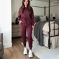Zweiteiliges Set aus lässigem Damen-Oberteil mit Rundhalsausschnitt und Hose