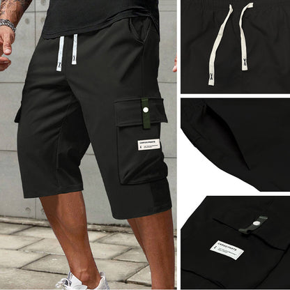 ✨🔥 Lässige 3/4-Cargo-Hose mit Kordelzug für Herren – ideal für urbane Abenteuer & warme Tage 🚀💪 Dank praktischer Taschen und lässigem Schnitt maximaler Komfort und Stil.