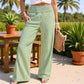 Damenhose mit gerafftem Bund und gestreiftem Gingham-Muster