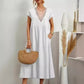 Elegantes Damenkleid mit V-Ausschnitt, kurzen Ärmeln und lockerer Passform