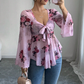 Damenbluse mit Blumenmuster, quadratischem Ausschnitt und geknoteter Vorderseite