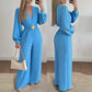 Elegante Jumpsuit mit V-Ausschnitt, weitem Bein und Gürtel