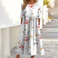 👗🌸 Elegantes langes Damenkleid mit Blumenmuster und Rundhalsausschnitt